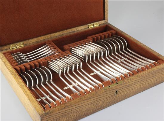 A 1930s canteen of silver rat tail pattern cutlery, by William Hutton & Sons, 52oz/1634 grams.